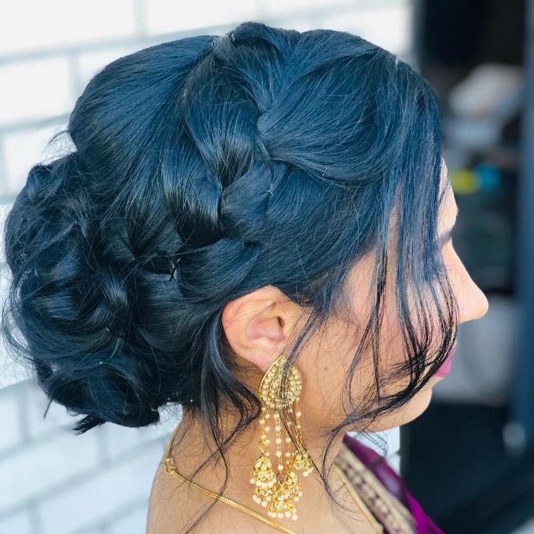 Low Bun with Loose Braid Updo